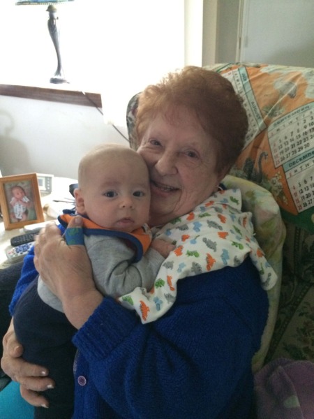 great-grandmother holding baby
